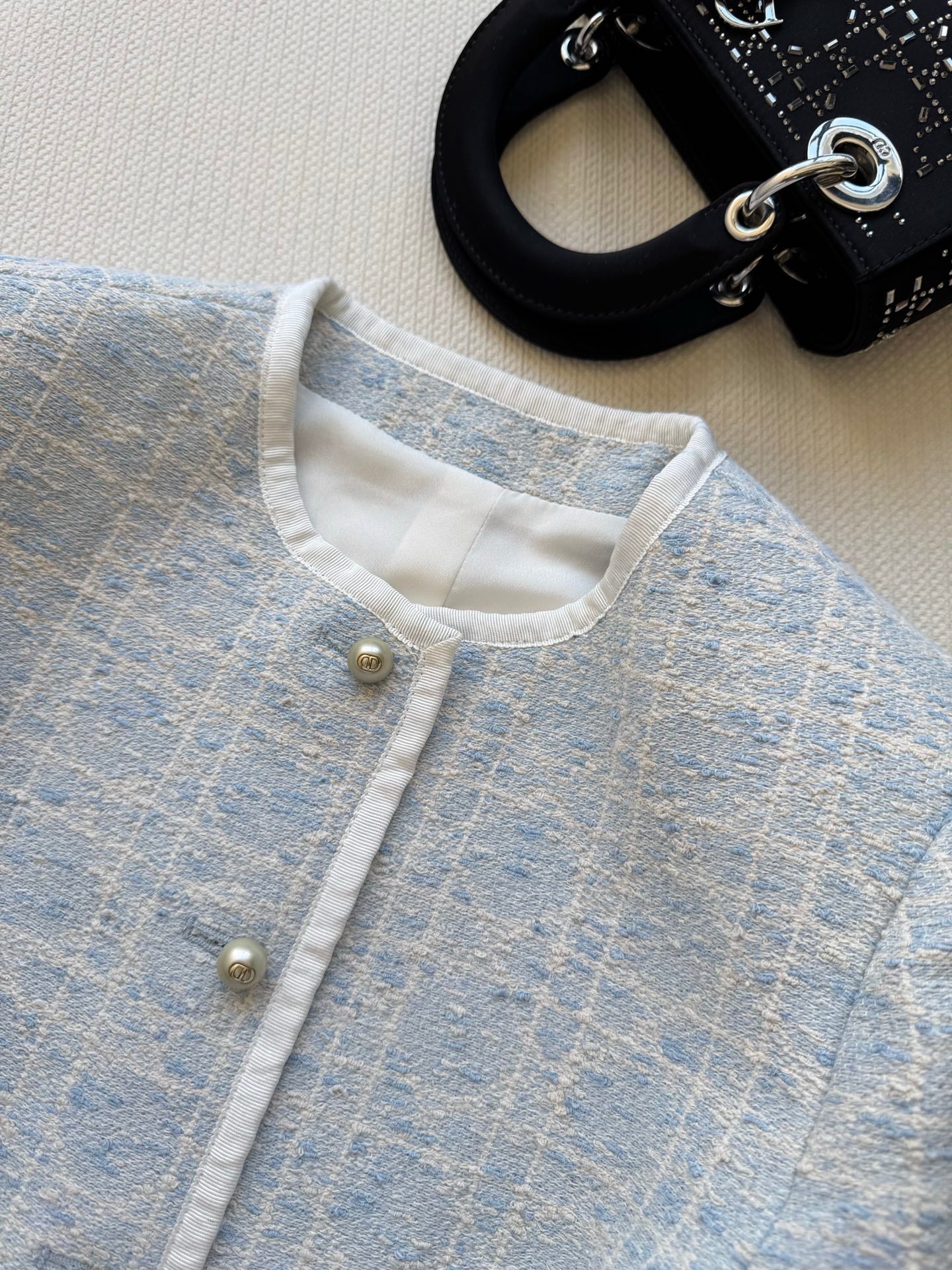 New limited edition Glacier Blue rattan check classic boxy round-neck blazer.