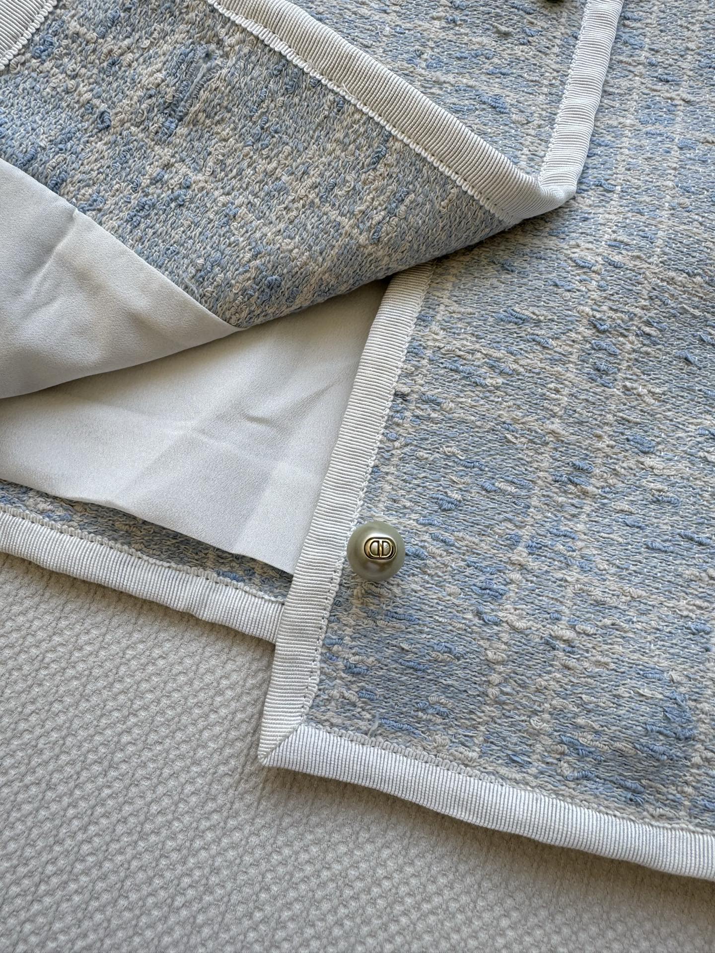 New limited edition Glacier Blue rattan check classic boxy round-neck blazer.