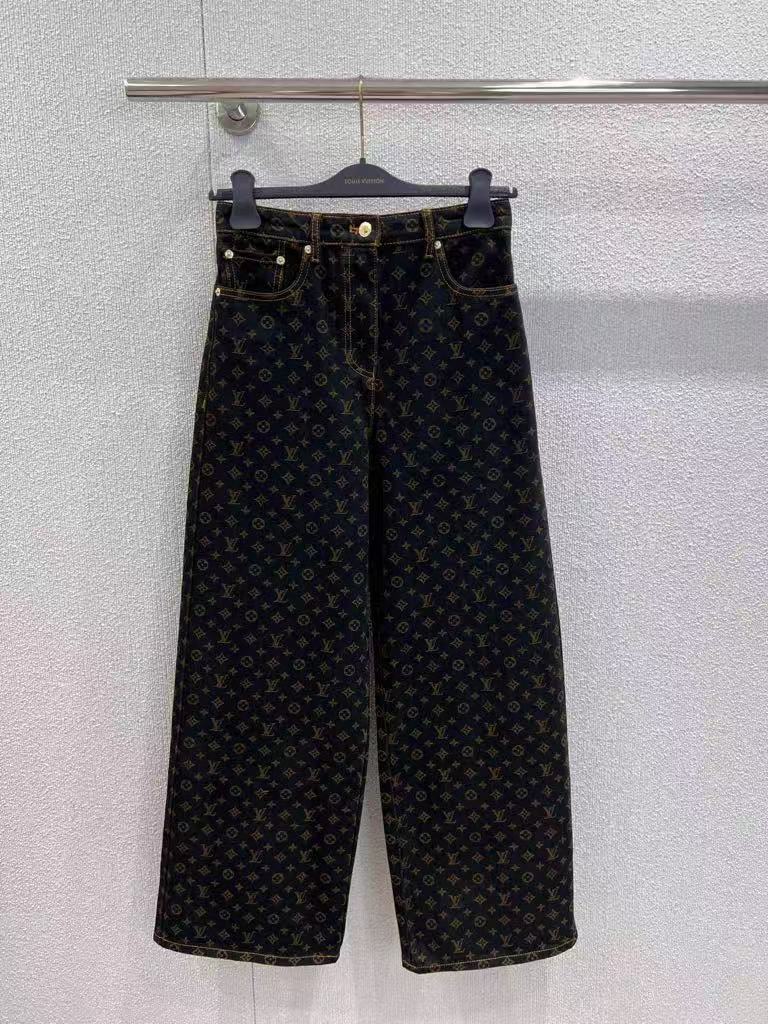 Vintage-printed wide-leg denim trousers.