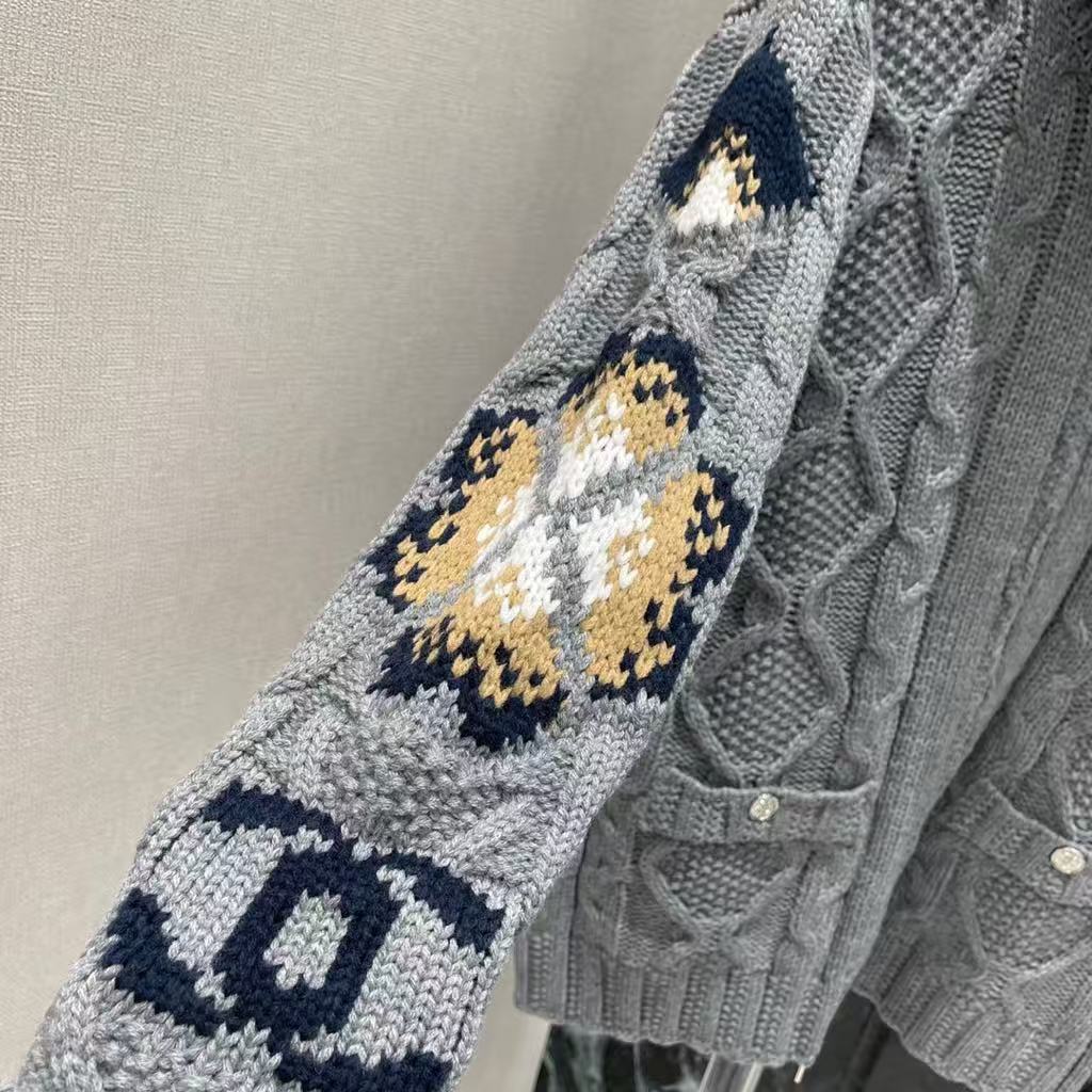 New for Early Fall 2025, this knitted jacquard zipper sweater