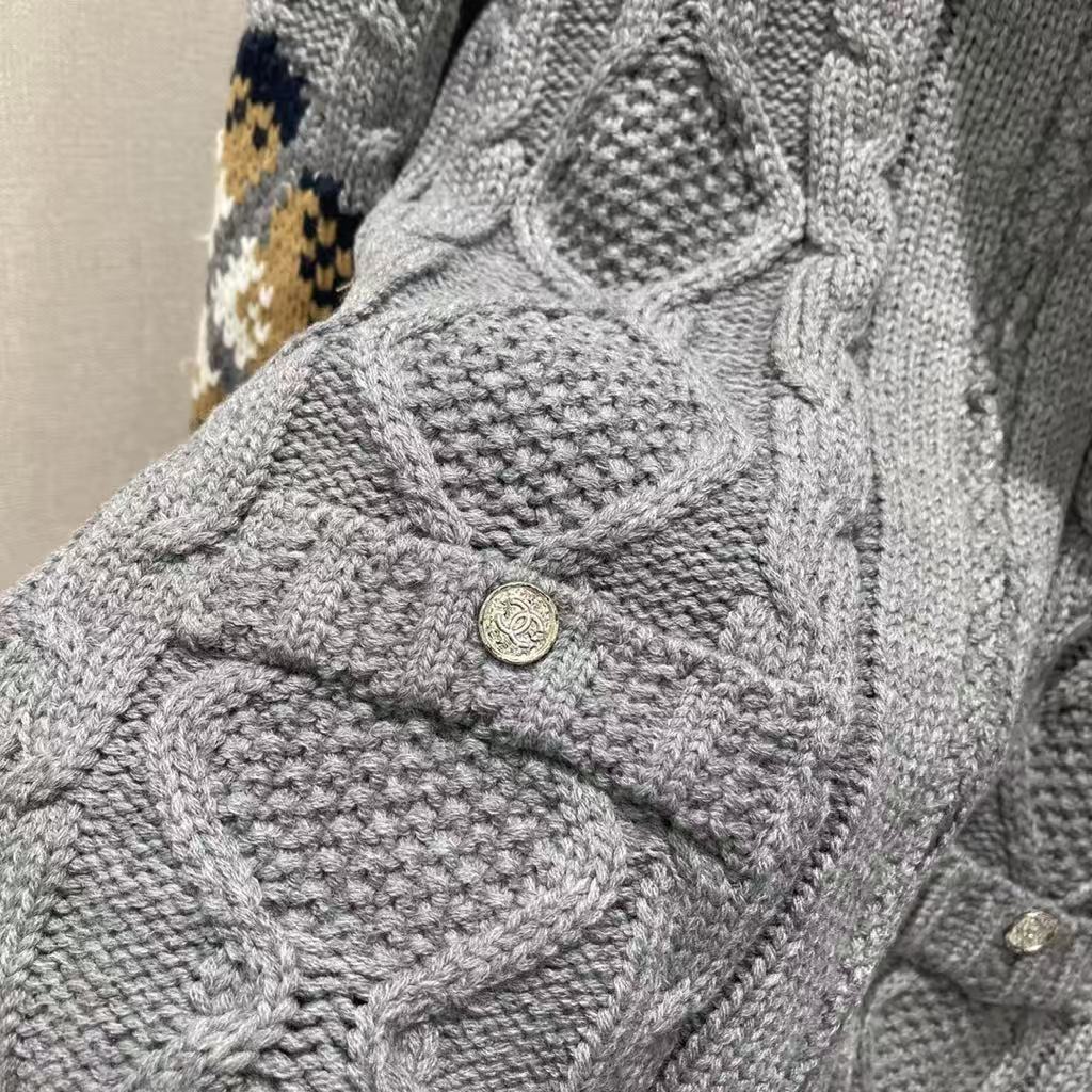 New for Early Fall 2025, this knitted jacquard zipper sweater
