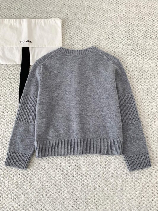 Suéter de cachemira con hebilla para mochila de otoño e invierno de Chan.