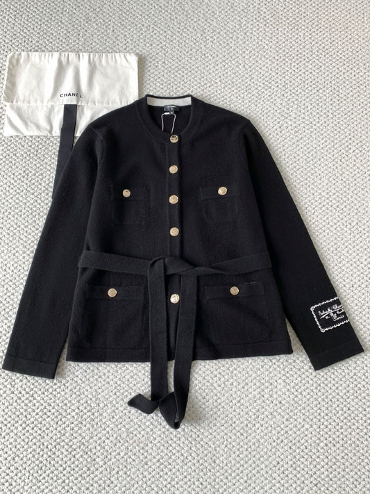 Lace-up knitted cardigan