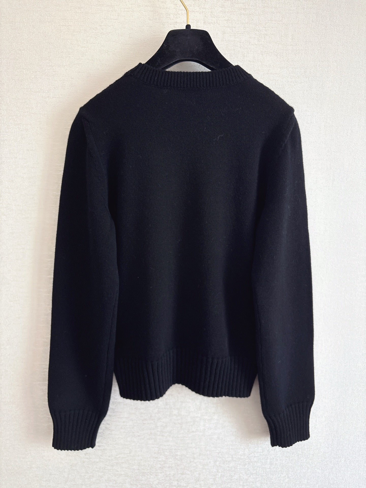 Openwork bow sweater
