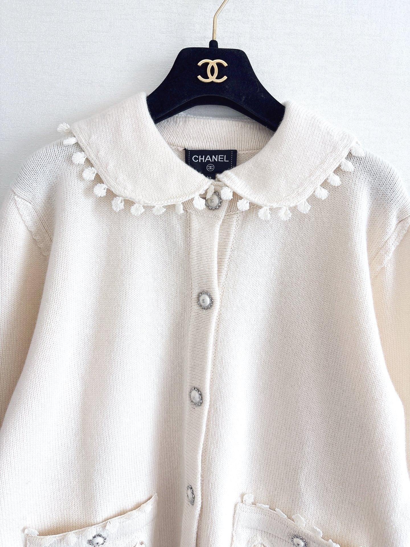 Bow-tie openwork pocket Peter Pan collar cardigan