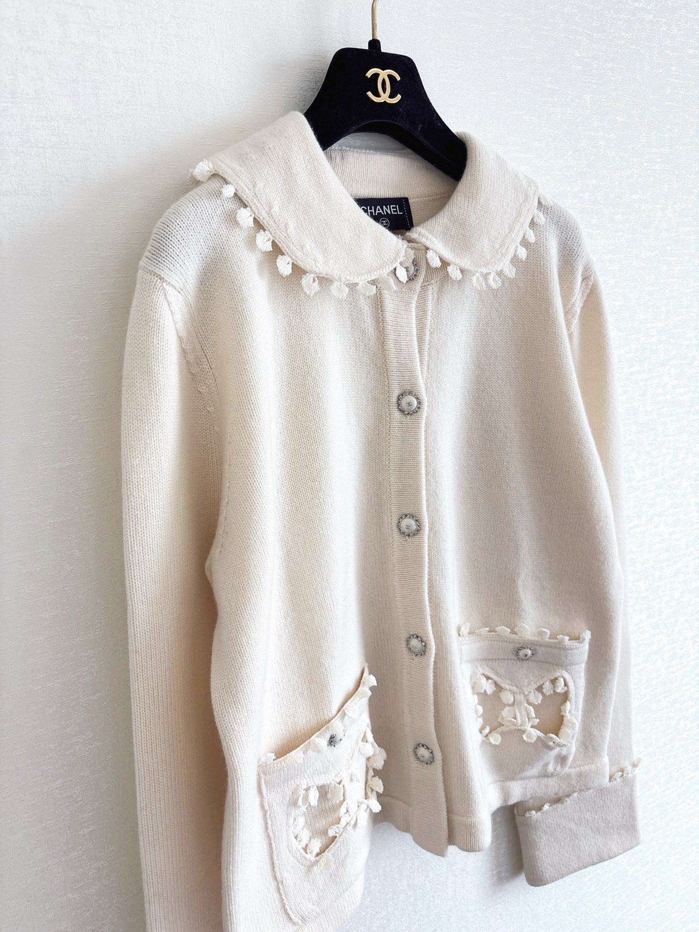 Bow-tie openwork pocket Peter Pan collar cardigan
