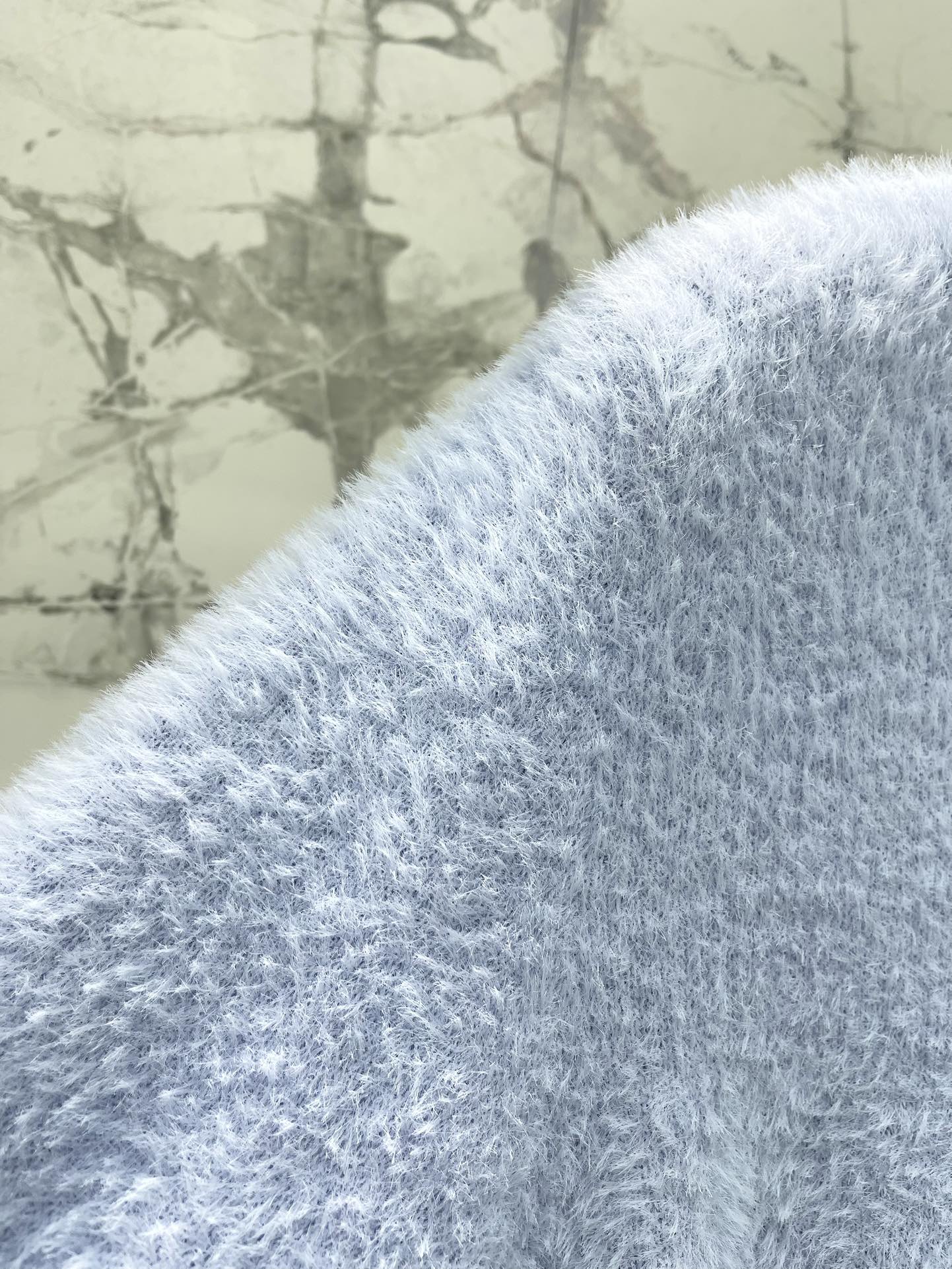 25FW Thick, color-blocked brushed knit cardigan