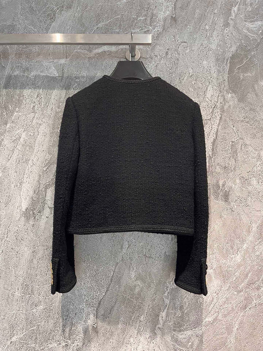 Chaqueta de tweed negra y dorada