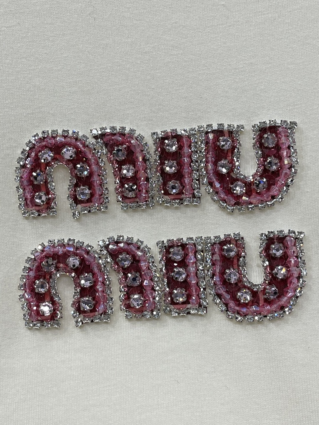 New style round neck T-shirt with pink rhinestone letters on the chest