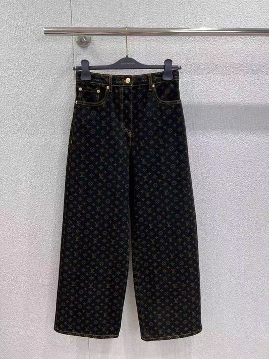 Vintage-printed wide-leg denim trousers.