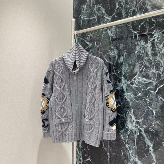 New for Early Fall 2025, this knitted jacquard zipper sweater