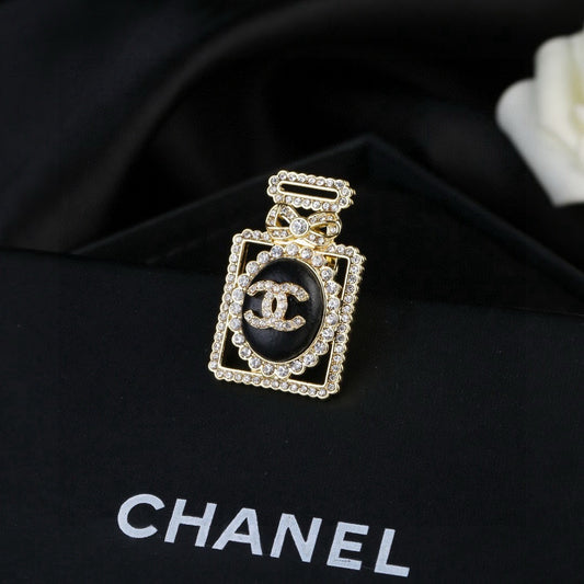 26SS NUEVO Broche de diamante de piel de cordero con botella de perfume