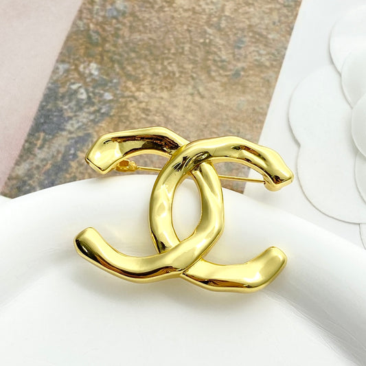 26SS NUEVO Broche doble C irregular