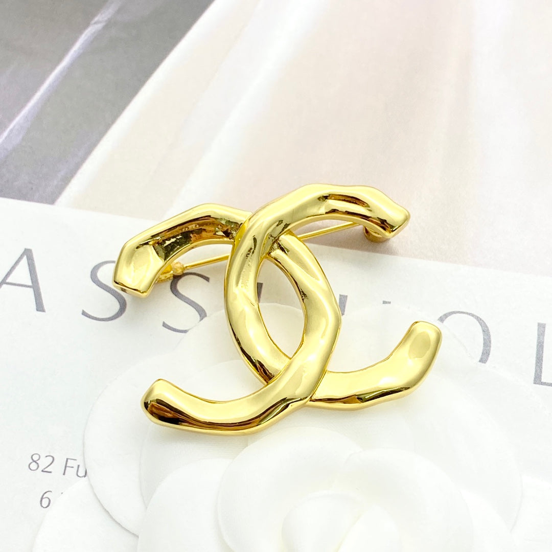 26SS NUEVO Broche doble C irregular