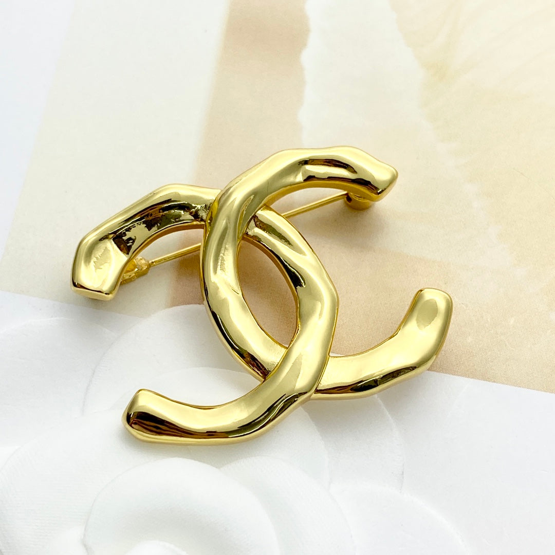 26SS NUEVO Broche doble C irregular