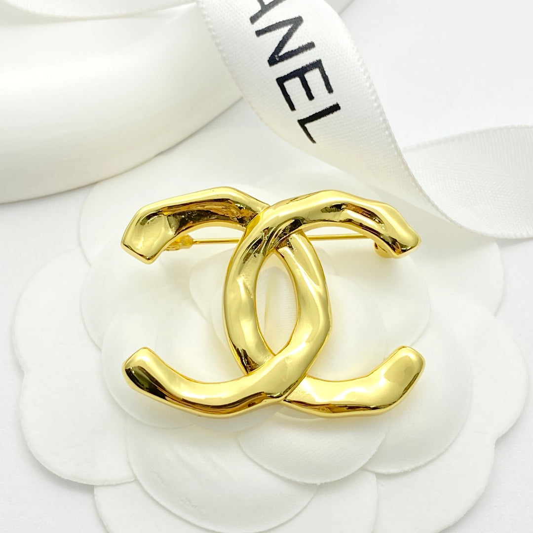 26SS NUEVO Broche doble C irregular