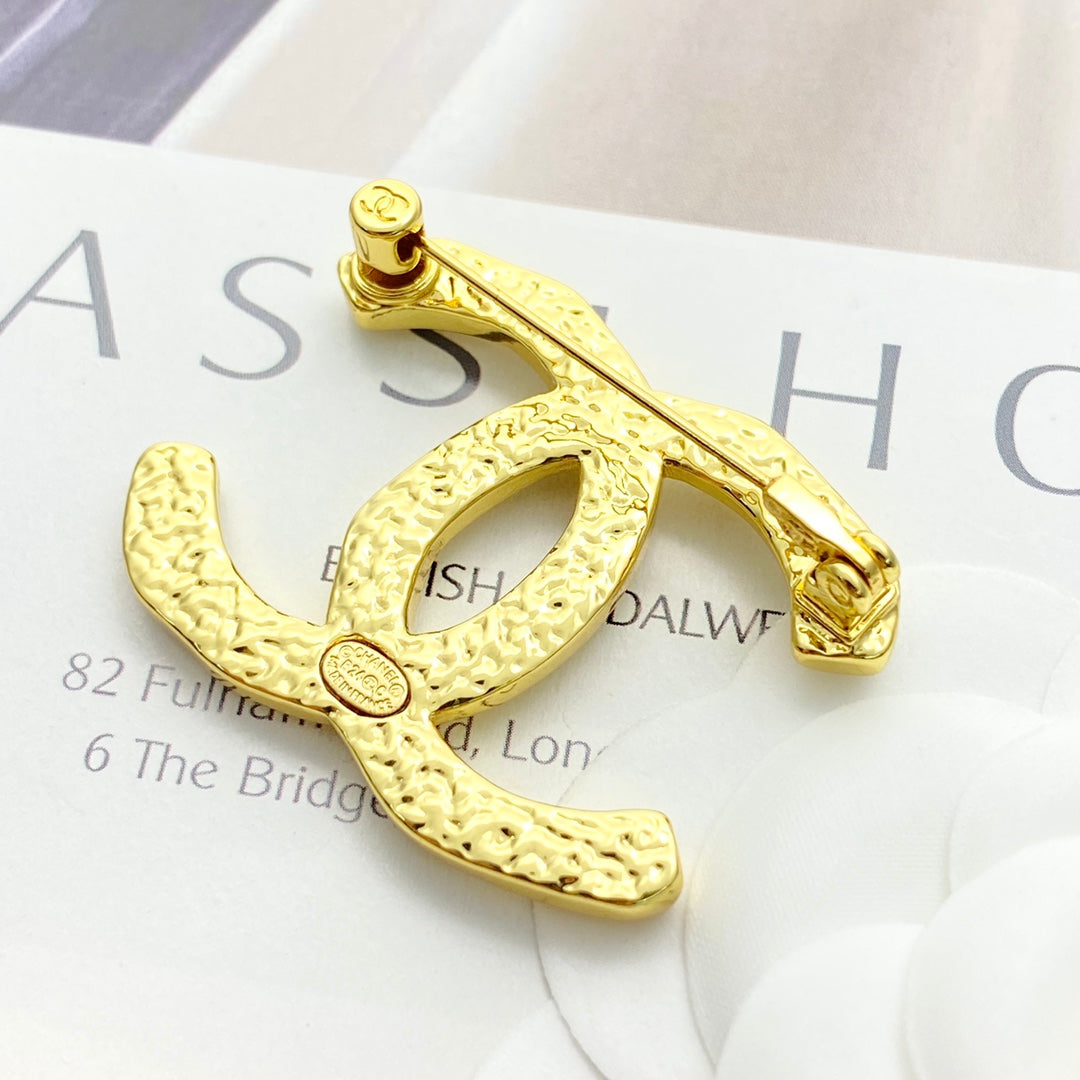 26SS NUEVO Broche doble C irregular