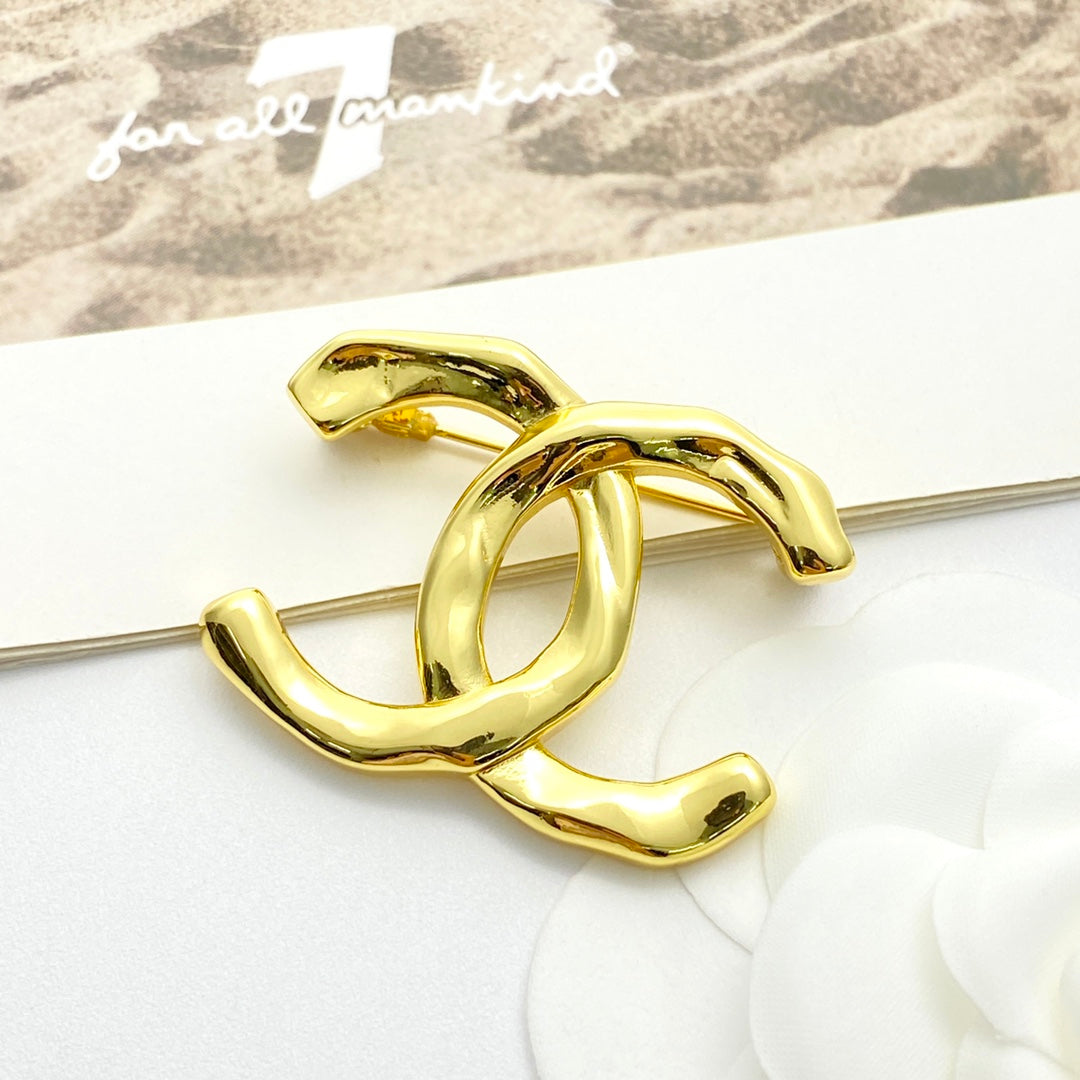 26SS NUEVO Broche doble C irregular