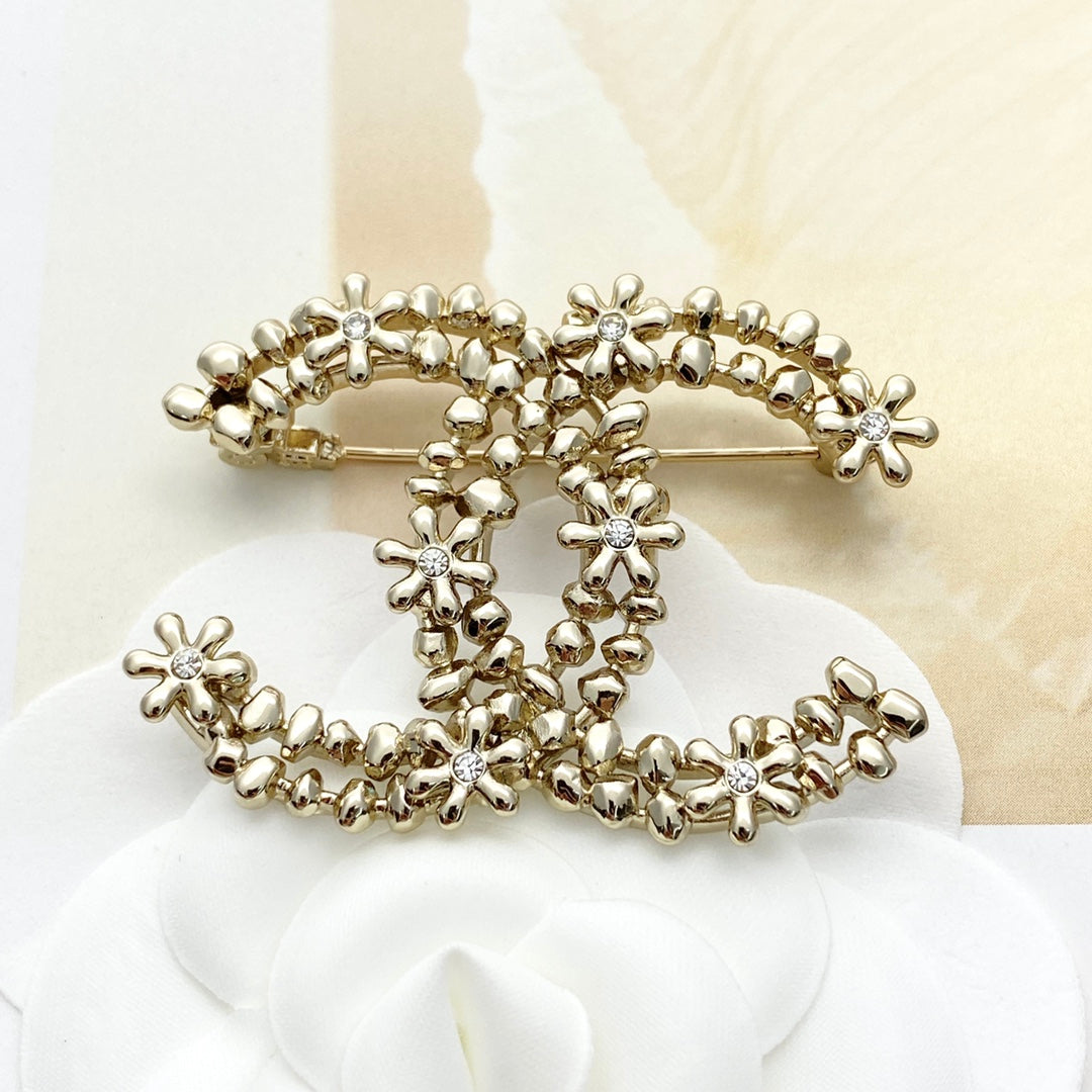 26SS NEW Light gold double c rhinestone flower brooch