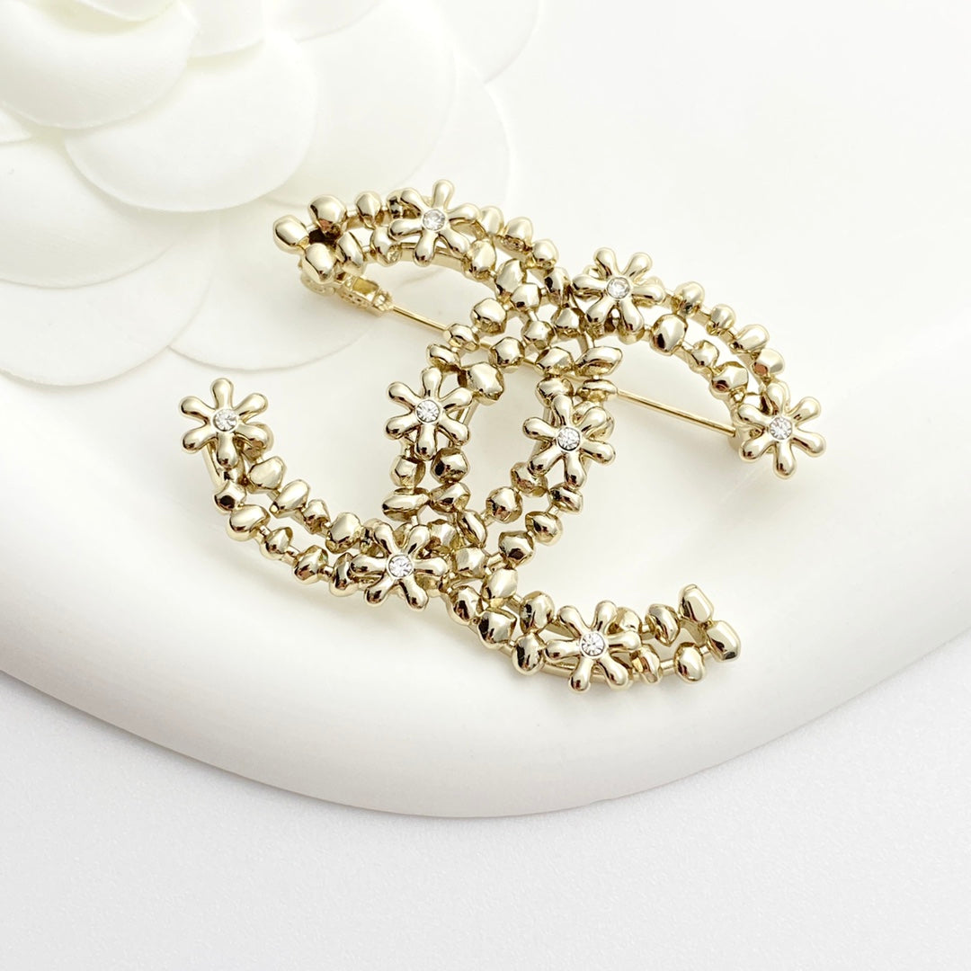 26SS NEW Light gold double c rhinestone flower brooch