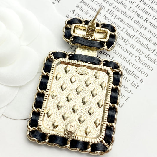 26SS NEW Black gold leather chain perfume bottle brooch