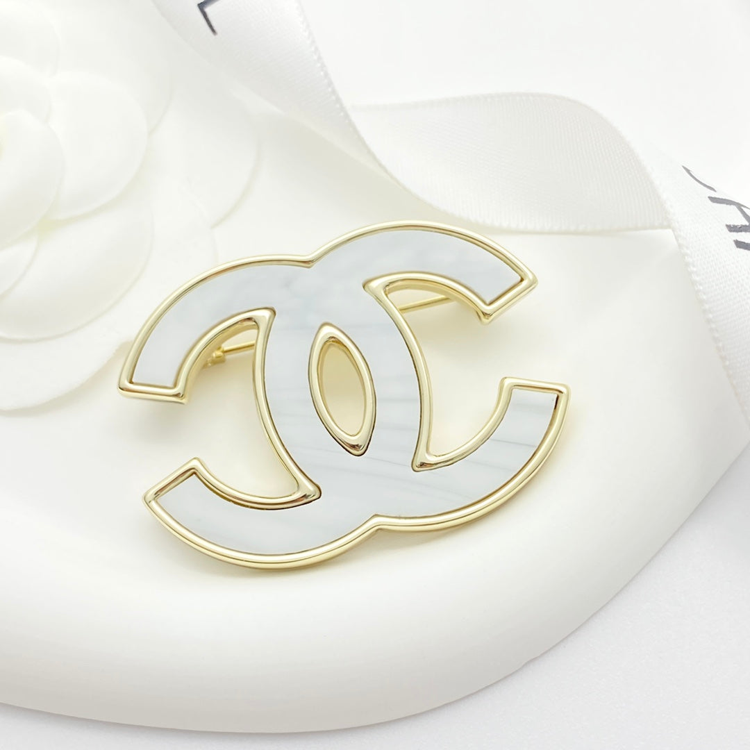 26SS NEW Double C ink white gold enamel brooch
