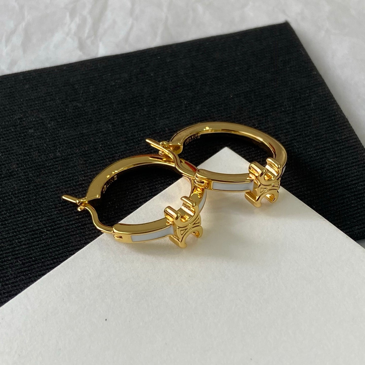 26FW New Triomphe White Ear Studs