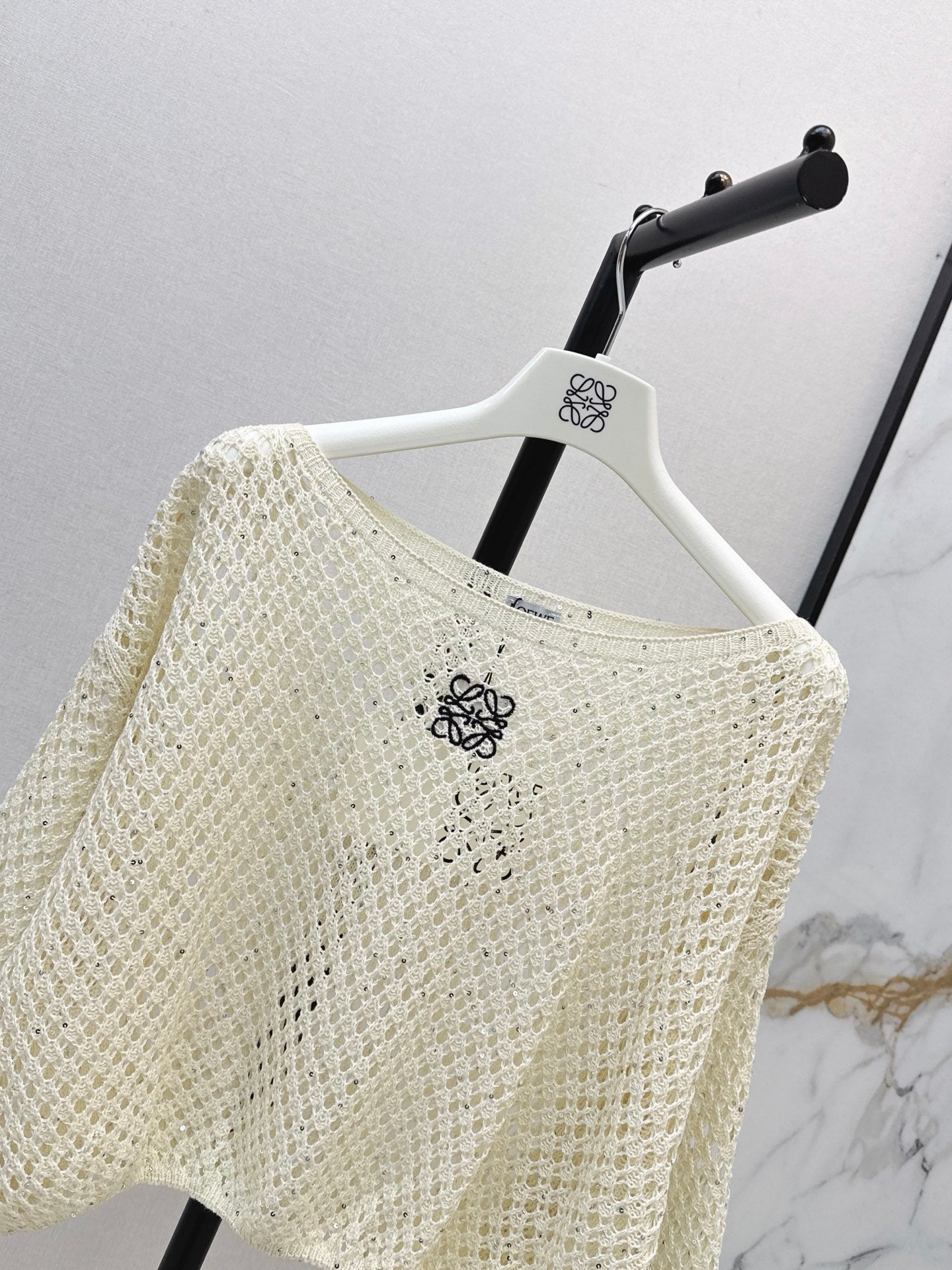 26FW Long-sleeve knit top with cut-out detail and new logo embroidery 🤍