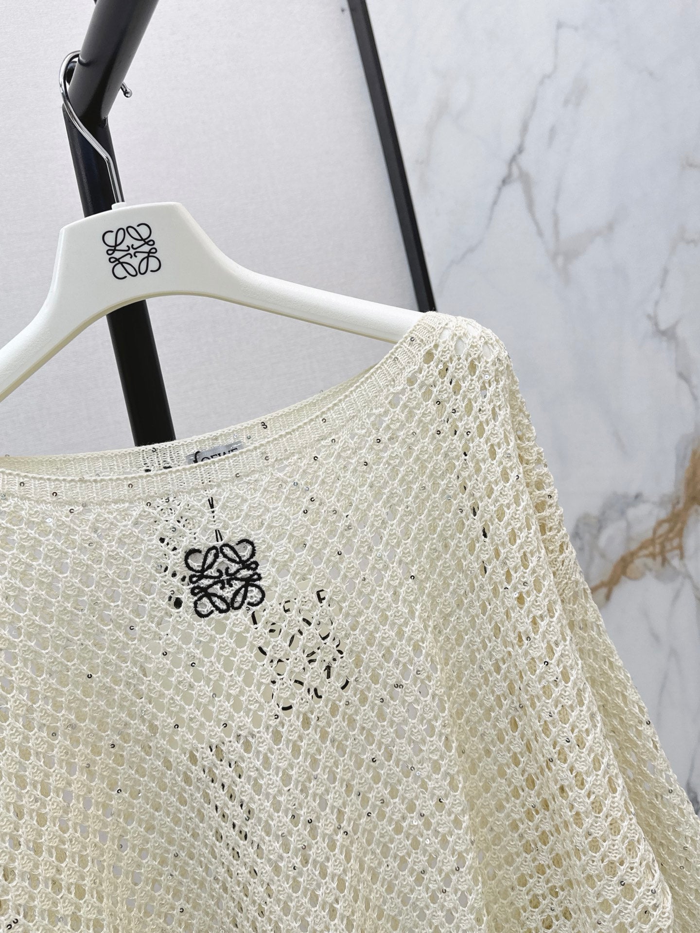 26FW Long-sleeve knit top with cut-out detail and new logo embroidery 🤍