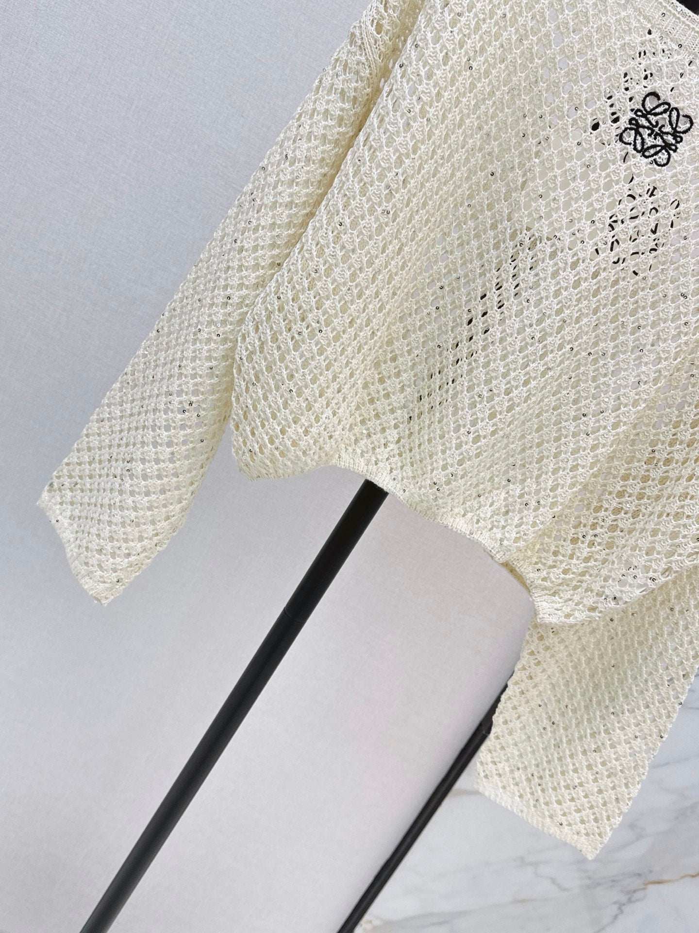 26FW Long-sleeve knit top with cut-out detail and new logo embroidery 🤍